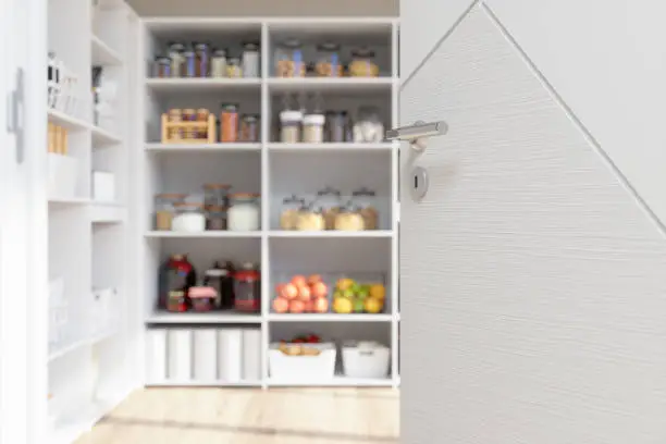 Photo of View Through The Open Door Into The Storage Room With Organised Pantry Items, Nonperishable Food Staples, Preserved Foods, Healthy Eating, Fruits And Vegetables.