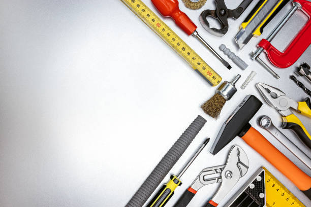 istock set of different professional hand tools for construction and renovation on metal desk. top view 1307510231