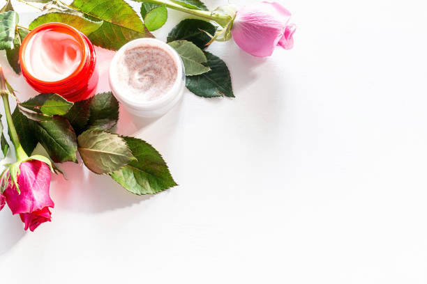 istock cream and flowers on white background 1307514758