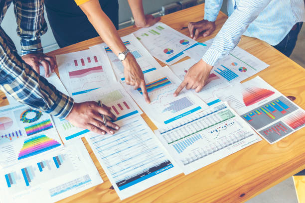istock Business strategy team report chart, graph, infographic data analyze financial report plan. Hands team partner planning marketing finance statistics sale report with excel spreadsheet accountting 1307515527