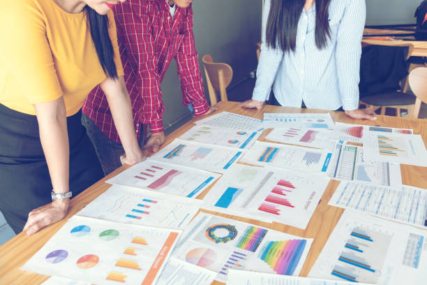 istock Business strategy team report chart, graph, infographic data analyze financial report plan. Hands team partner planning marketing finance statistics sale report with excel spreadsheet accountting 1307515532