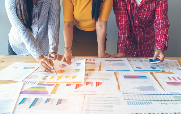 istock Business strategy team report chart, graph, infographic data analyze financial report plan. Hands team partner planning marketing finance statistics sale report with excel spreadsheet accountting 1307515534
