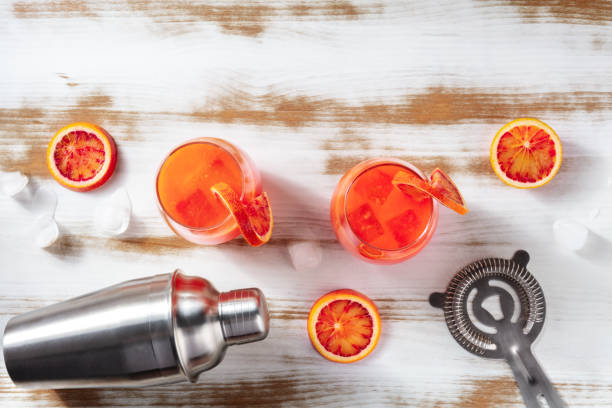 istock Cocktails with blood oranges, a shaker, and a strainer 1307516260
