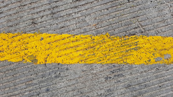 Yellow Line on the street of alley during the day from top, Surabaya 28 January 2021