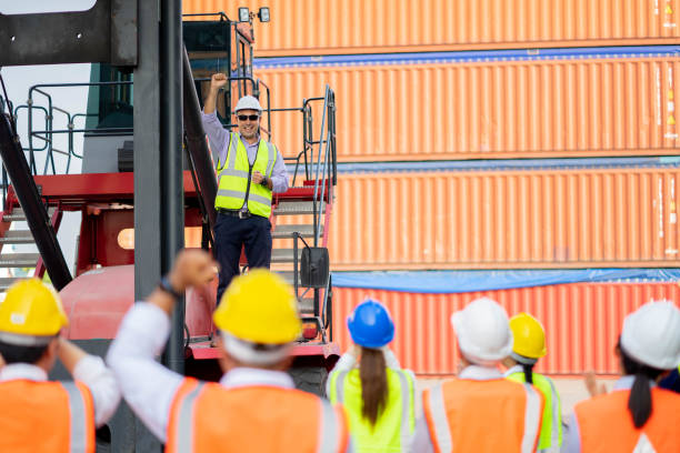 istock Worker team meeting and training, Logistics and transportation business Containers import concept, Work successful. 1307516450
