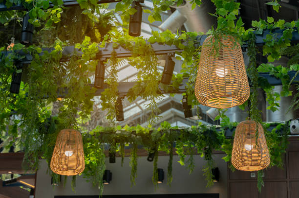 istock Rattan lamp on the textured background on the ceiling 1307518250
