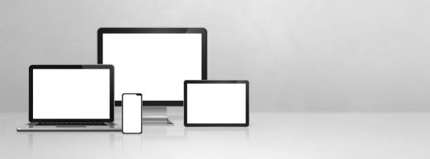 istock computer, laptop, mobile phone and digital tablet pc. white concrete banner 1307519800
