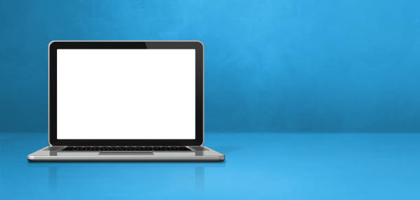 istock Laptop computer on blue office scene background banner 1307519838
