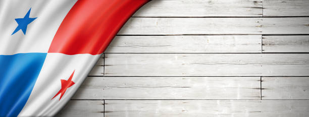 istock Panamanian flag on old white wall banner 1307519900