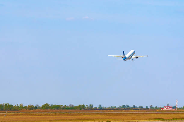 istock Passenger plane takes off from runway in airport 1307520896