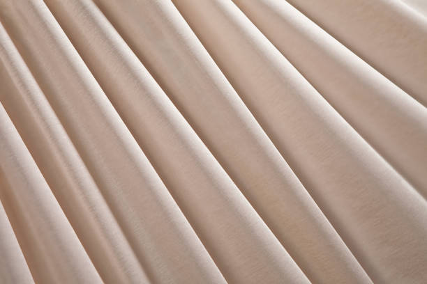 istock Beige luxury fabric background 1307525684