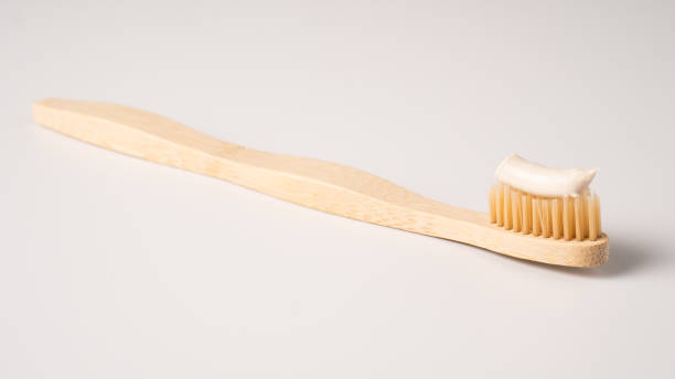 istock Bamboo toothbrush isolated on a white background. Eco dental concept. Zero waste 1307526772
