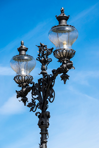 Classic old street lamp in Warsaw, Poland