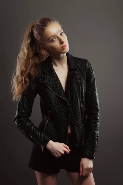 istock Fashionable young model posing for model tests  in leather jacket 1307526961