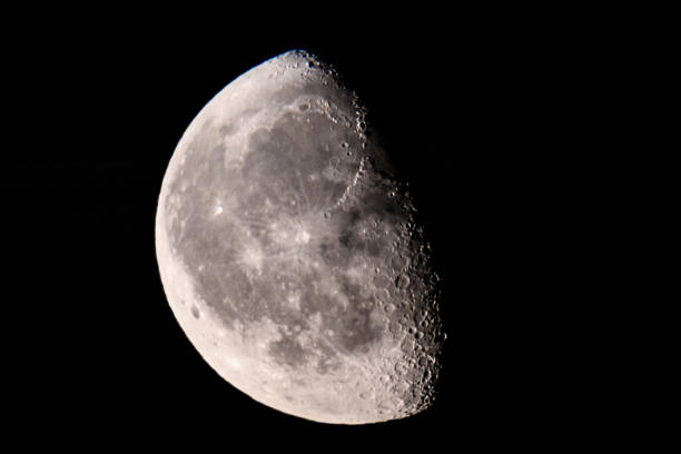 istock Moon with a clearly visible moon surface in the dark night sky. 1307530892
