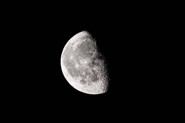 istock Moon with a clearly visible moon surface in the dark night sky. 1307530899
