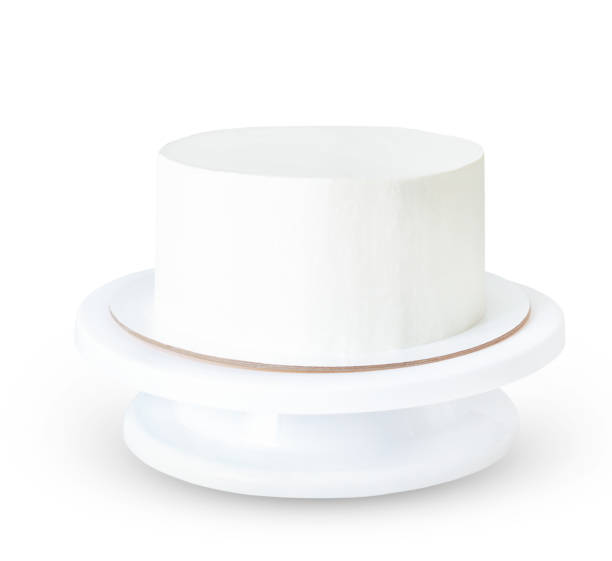 istock white cake without decor on a stand isolated on white background. even round cake mockup and sample 1307531781