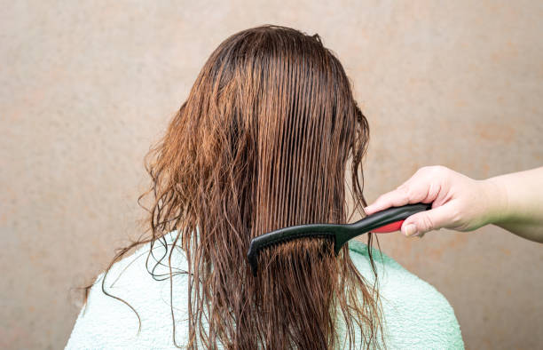 Combing Wet Hair Stock Photos, Pictures & Royalty-Free Images - iStock