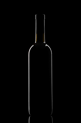 White and red wine glasses and bottle isolated on white background.