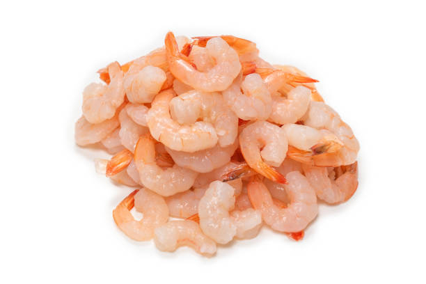 istock Frozen shrimps background. Top view. 1307537857
