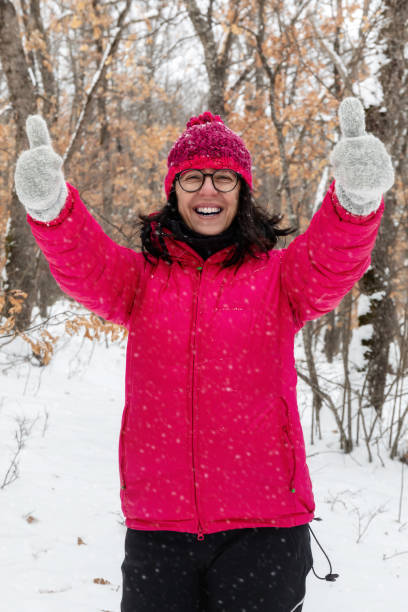 istock Happy in the snow, ok sign 1307540727