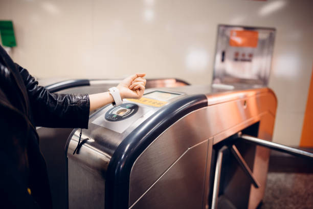 istock Smartwatch contactless payment. Using smart watch to pay at subway station. 1307540801