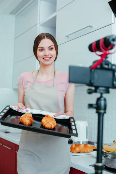 istock Charismatic blogger recording new video about pastry 1307541978