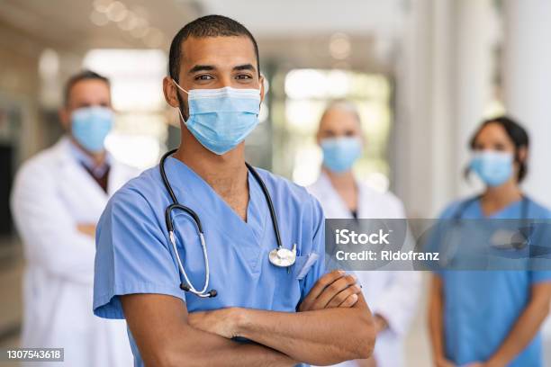 Team Of Doctors And Nurses In Hospital Stock Photo - Download Image Now - Doctor, Nurse, Healthcare And Medicine