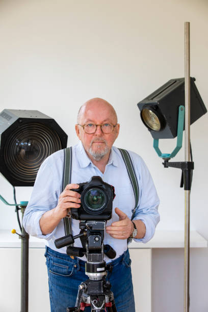 istock Senior Male Photographer 1307547503