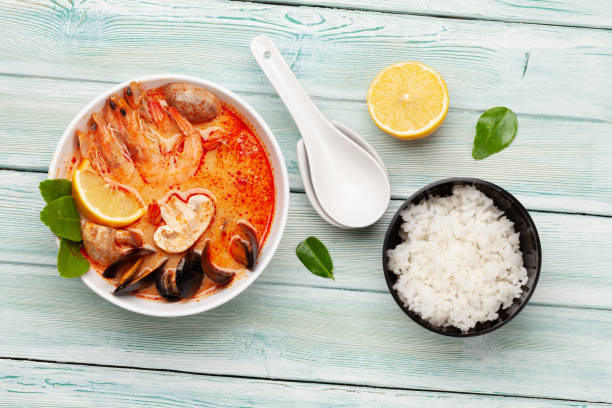 istock Traditional Thai soup Tom Yum and rice bowl 1307547722