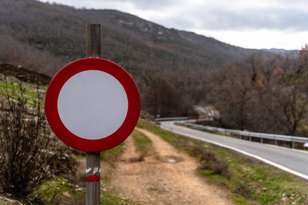 Traffic Prohibited Sign in Mountain Road. Safety Concept. No Thoroughfare Sign in the Mountain