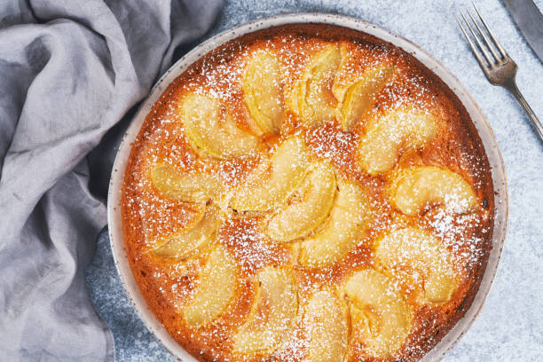 istock Composition with delicious apple tart on light background 1307550268