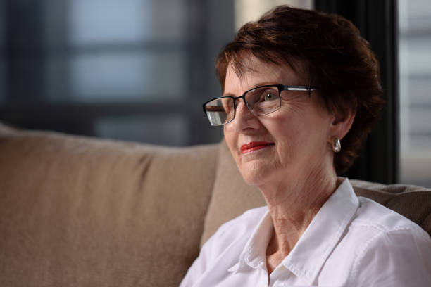 istock Woman Smiling senior at home 1307552768