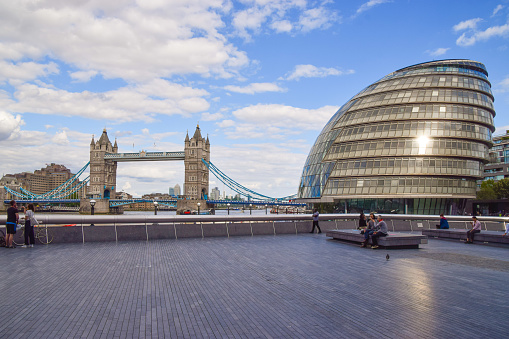 London, United Kingdom - July 11 2020: daytime view of Tower Bridge and GLA (Greater London Authority) Building.