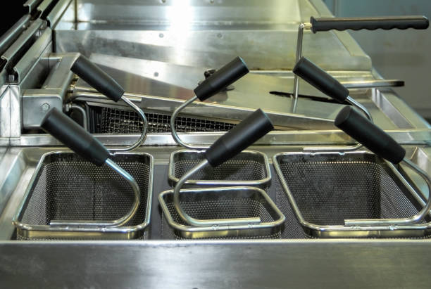 istock A multitude of empty fryers ready to use 1307554723