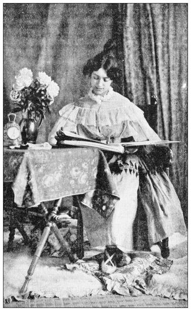 istock Antique black and white photograph: Woman reading 1307554962