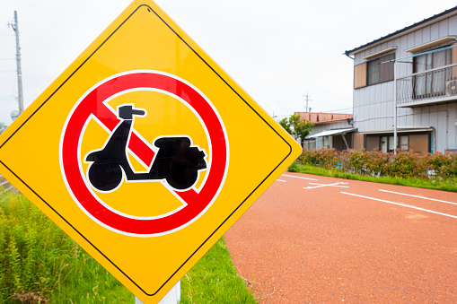 Signs that prohibit entry of moped motorcycles