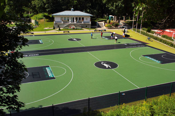 Tallinn, Estonia - July 8, 2017: Basketball fields in Toompark, a public park near Toompea hill. Its green lawns and Snelli pond are popular recreational places among locals and tourists.