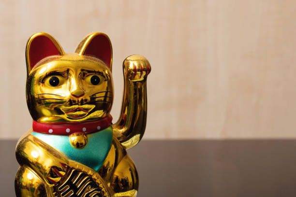 istock Maneki neko cat closeup, japan lucky charm 1307560668