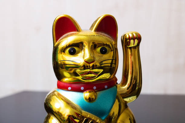 istock Maneki neko cat closeup, japan lucky charm 1307560887