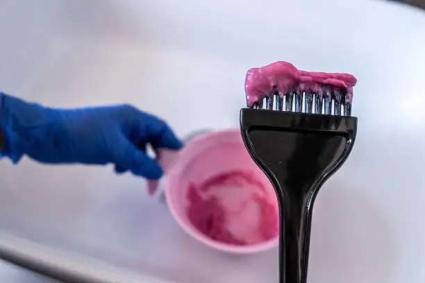 Pink Vibrant Hair Dye Coloring brush Close Up