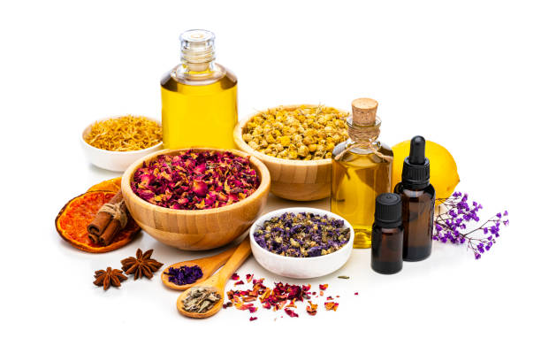 istock Aromarherapy: essential oils, massage oils, dried flowers on white background 1307561190