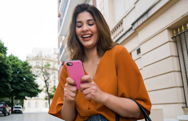 istock Young woman using her mobile phone. 1307561202