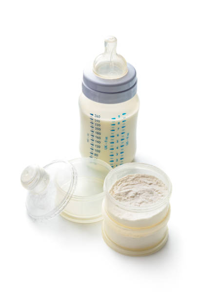 istock Baby Goods: Baby Bottle and Formula Isolated on White Background 1307562879