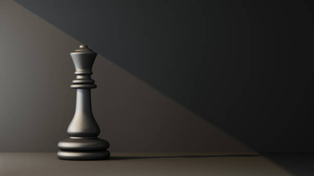 istock black queen chess figure illuminated by a ray of light 1307564996