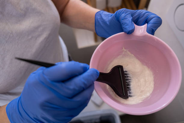 Mixing bleach for hair Coloring Close Up