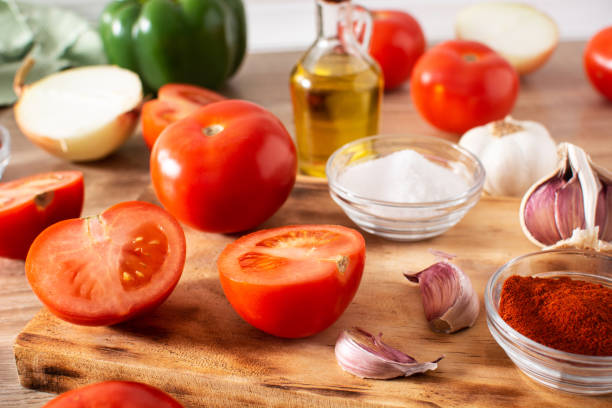 istock Preparing tomato sauce in the kitchen. Ingredients on the kitchen counter 1307566610