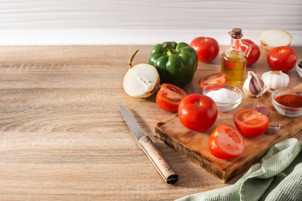 istock Preparing tomato sauce in the kitchen. Ingredients on the kitchen counter 1307566714