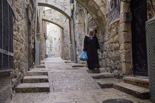 Jerusalem, Israel - 16 June 2019: Beautiful photo streets of the Old City of Jerusalem. Streets of Old Jerusalem, Holy City. Ancient Alley in Jewish Quarter, Jerusalem