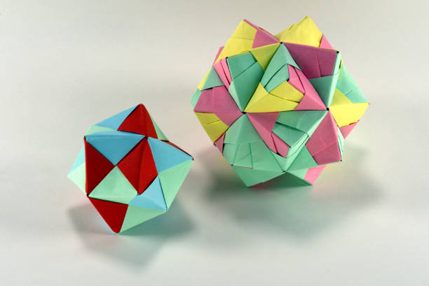 istock Self-made colorful origami star cube on white background. 1307571199